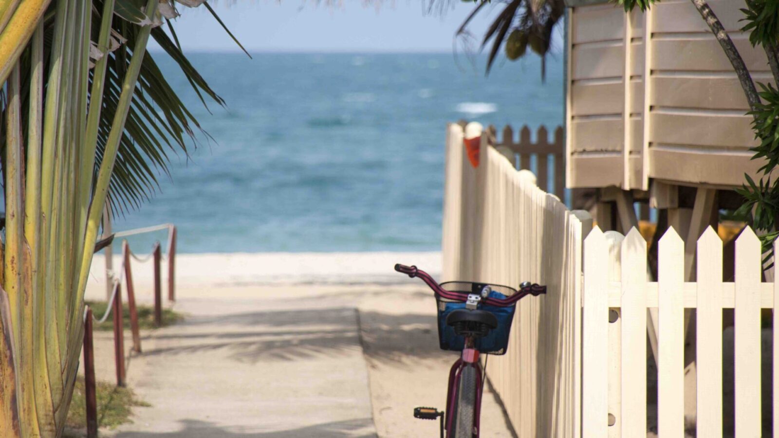 MFI - adventures in Key West bike next to beach hut - florida-guidebook-com-Key West-unsplash